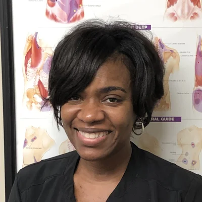 A headshot photo of Dominique