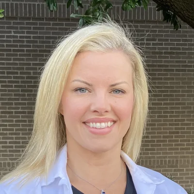 A headshot photo of Erin Hines